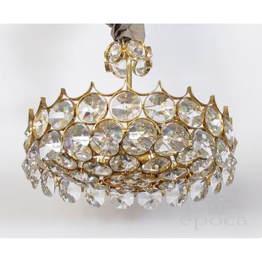 a chic 1960's gilt-brass and crystal 6-light pendant chandelier designed by Gaetano Sciolari for Palwa