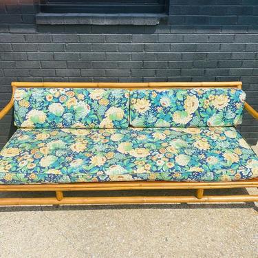 Pretzel tiki-tastic sofa manufactured by South Pacific Rattan Co 76” L x 33” d x cushion to floor ht 14” 