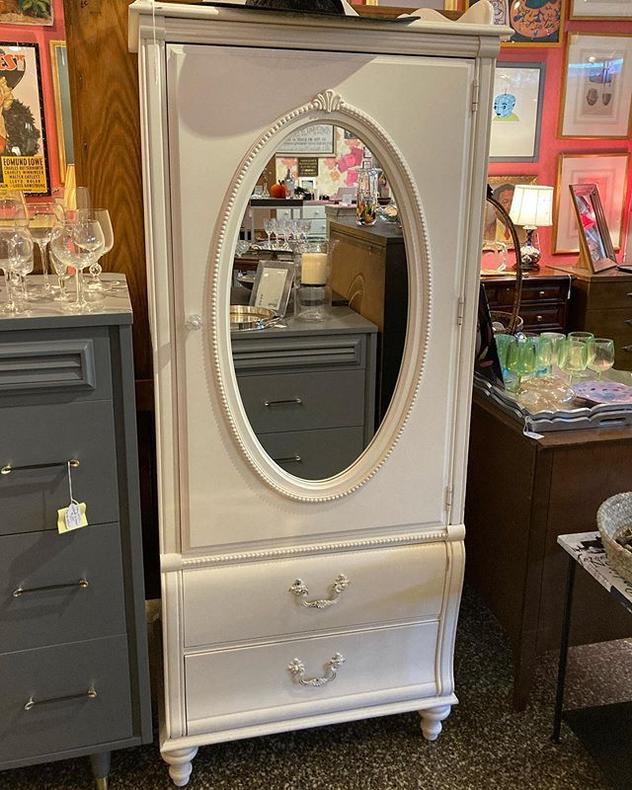 Mirrored armoire with 2 drawers. 28” wide, 20“ deep, 72” tall. 